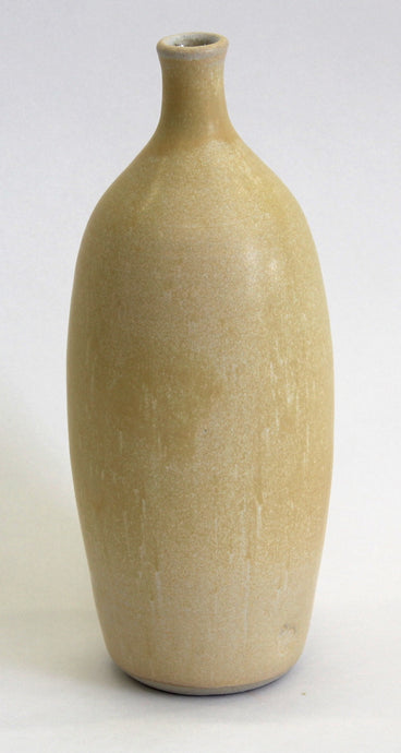 Tall yellow ceramic bottle vase